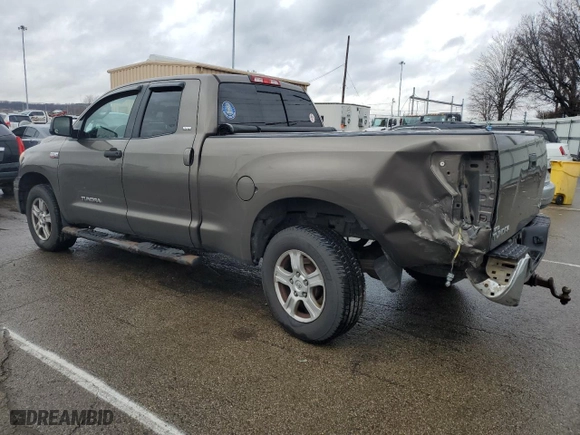 2011 Toyota Tundra 4WD Truck with VIN 5TFUY5F10BX161708, listed as a Copart auction lot 87011954 with 122,825 mi miles and Salvage Title. Bid and sale history available at carsss.com. Image 2.