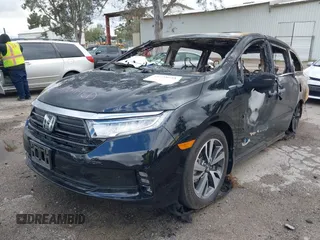 2024 Honda Odyssey Touring with VIN 5FNRL6H86RB001020, listed as a IAAI auction lot 41738645 with Not provided miles and . Bid and sale history available at DreamBid. Image 2.