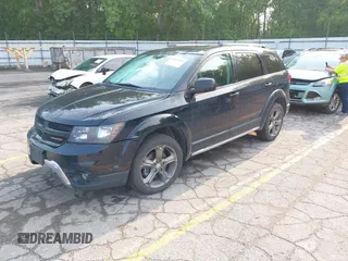 2015 Dodge Journey Crossroad with VIN 3C4PDDGG6FT740760, listed as a IAAI auction lot 42428742 with 215,219 mi miles and . Bid and sale history available at DreamBid. Image 2.