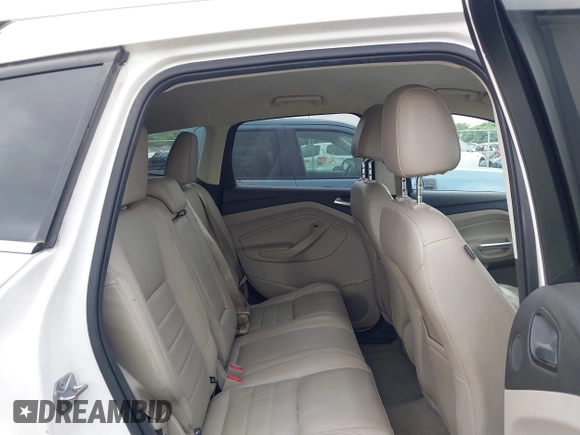 2016 Ford Escape Titanium with VIN 1FMCU9JX4GUB72080, listed as a IAAI auction lot 42519240 with 121,793 mi miles and . Bid and sale history available at DreamBid. Image 8.