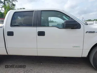 2014 Ford F-150 XL z VIN 1FTFW1CT8EFB94222, wystawiony jako IAAI lot #42032226 z przebiegiem 156 984 mil mil oraz . Historia ofert i sprzedaży dostępna na DreamBid. Obrazek 13.