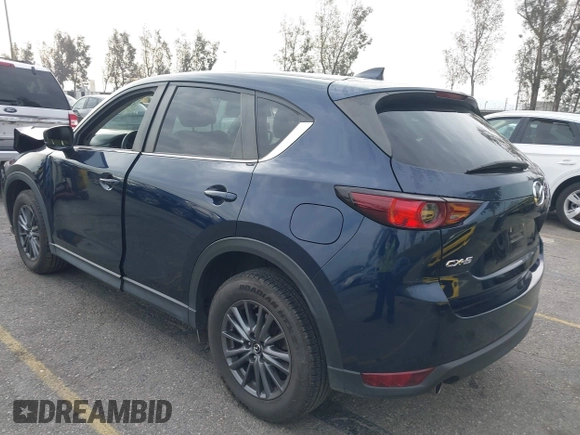 2019 Mazda CX-5 Touring with VIN JM3KFACM5K0697137, listed as a IAAI auction lot 41720253 with 50,416 mi miles. Bid and sale history available at carsss.com. Image 3.