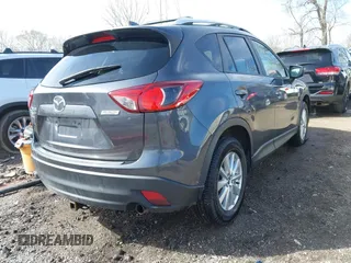 2016 Mazda CX-5 Touring with VIN JM3KE4CY9G0915305, listed as a IAAI auction lot 41840519 with 188,702 mi miles and . Bid and sale history available at carsss.com. Image 4.
