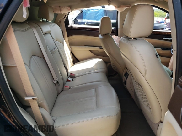 2015 Cadillac SRX Luxury Collection z VIN 3GYFNBE35FS534651, wystawiony jako Copart lot #59124955 z przebiegiem Nie podano mil oraz Szkoda całkowita • Salvage title. Historia ofert i sprzedaży dostępna na DreamBid. Obrazek 11.