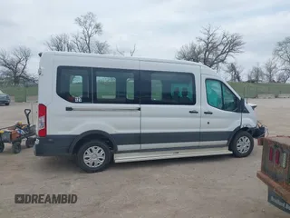 2019 Ford Transit with VIN 1FTYR2CM3KKA06742, listed as a IAAI auction lot 42062863 with 96,461 mi miles. Bid and sale history available at carsss.com. Image 14.