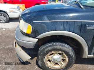 2002 Ford Expedition Eddie Bauer with VIN 1FMPU18L62LA76777, listed as a IAAI auction lot 42718720 with Not provided miles and . Bid and sale history available at DreamBid. Image 12.