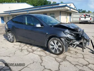 2022 Tesla Model Y Long Range z VIN 7SAYGDEE1NF430383, wystawiony jako Copart lot #56208825 z przebiegiem 60 612 mil mil oraz Szkoda całkowita • Salvage title. Historia ofert i sprzedaży dostępna na DreamBid. Obrazek 4.