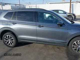 2021 Volkswagen Tiguan SE with VIN 3VV3B7AX8MM071303, listed as a IAAI auction lot 41109686 with 40,684 mi miles and . Bid and sale history available at DreamBid. Image 13.