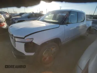 2022 Rivian R1T Adventure z VIN 7FCTGAAA9NN014280, wystawiony jako Copart lot #87908175 z przebiegiem 28 601 mil mil oraz Szkody całkowita. Historia ofert i sprzedaży dostępna na DreamBid. Obrazek 1.