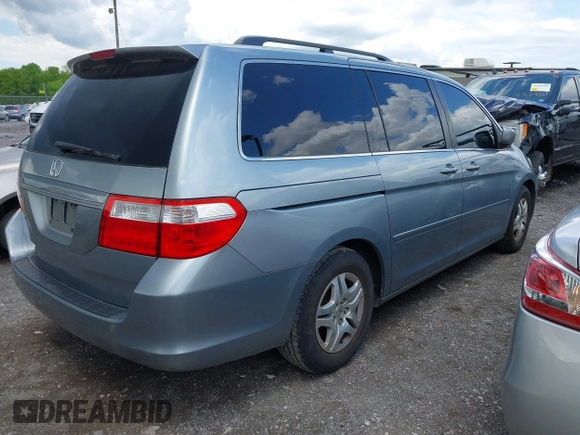 2007 Honda Odyssey EX-L with VIN 5FNRL38747B121059, listed as a IAAI auction lot 42211056 with 171,838 mi miles and . Bid and sale history available at DreamBid. Image 4.