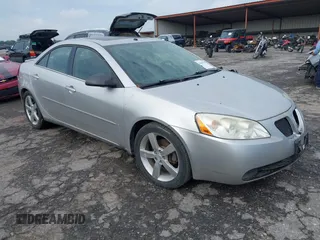 2006 Pontiac G6 GTP z VIN 1G2ZM551864235844, wystawiony jako IAAI lot #42088507 z przebiegiem 170 376 mil mil oraz . Historia ofert i sprzedaży dostępna na DreamBid. Obrazek 1.