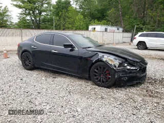 2014 Maserati Ghibli S Q4 z VIN ZAM57RTA8E1083877, wystawiony jako Copart lot #57812725 z przebiegiem 94 088 mil mil oraz Czysty tytuł • Clean title. Historia ofert i sprzedaży dostępna na DreamBid. Obrazek 4.