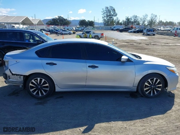 2018 Nissan Altima 2.5 SR with VIN 1N4AL3AP8JC245126, listed as a IAAI auction lot 41703017 with 101,292 mi miles. Bid and sale history available at carsss.com. Image 14.