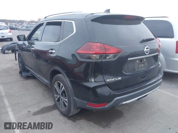 2018 Nissan Rogue SV with VIN 5N1AT2MT2JC809572, listed as a IAAI auction lot 41795161 with 93,587 mi miles and . Bid and sale history available at carsss.com. Image 3.