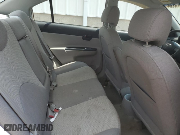 2006 Hyundai Accent GL z VIN KMHCN45C26U052459, wystawiony jako Copart lot #60089355 z przebiegiem 247 311 mil mil oraz Szkoda całkowita • Salvage title. Historia ofert i sprzedaży dostępna na DreamBid. Obrazek 10.