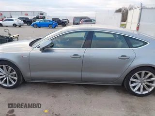 2014 Audi A7 Premium Plus z VIN WAUWGAFC9EN096702, wystawiony jako IAAI lot #41202201 z przebiegiem 103 893 mil mil oraz . Historia ofert i sprzedaży dostępna na DreamBid. Obrazek 14.