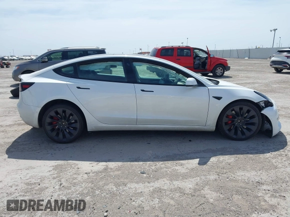 2021 Tesla Model 3 Performance with VIN 5YJ3E1EC8MF044388, listed as a IAAI auction lot 41821892 with Not Provided miles and . Bid and sale history available at carsss.com. Image 12.