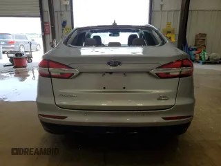 2020 Ford Fusion SE z VIN 3FA6P0LUXLR194471, wystawiony jako Copart lot #55616175 z przebiegiem 94 169 mil mil oraz Tytuł czysty. Historia ofert i sprzedaży dostępna na DreamBid. Obrazek 6.