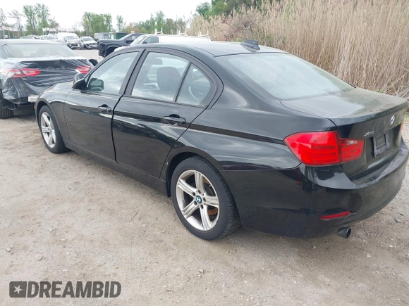 2014 BMW 3 Series 320i xDrive with VIN WBA3C3G5XENS68374, listed as a IAAI auction lot 42042243 with 107,830 mi miles. Bid and sale history available at carsss.com. Image 3.
