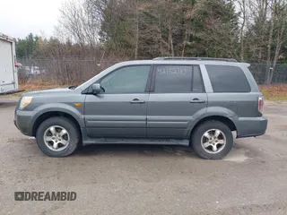 2007 Honda Pilot EX-L with VIN 2HKYF18667H526601, listed as a IAAI auction lot 42182710 with 221,948 mi miles and . Bid and sale history available at carsss.com. Image 12.