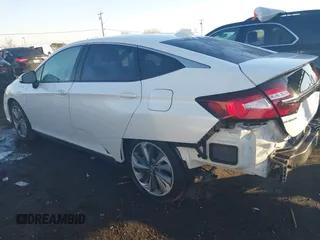 2018 Honda Clarity z VIN JHMZC5F11JC013866, wystawiony jako IAAI lot #38266703 z przebiegiem 97 522 mil mil oraz . Historia ofert i sprzedaży dostępna na DreamBid. Obrazek 3.