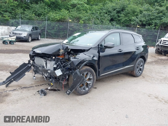 2023 Kia Sportage SX-Prestige with VIN KNDPXCAG3P7077955, listed as a IAAI auction lot 42456463 with 24,699 mi miles and . Bid and sale history available at DreamBid. Image 2.