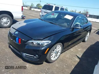 2016 BMW 2 Series 228i with VIN WBA1F9C5XGV545664, listed as a IAAI auction lot 39327505 with 94,583 mi miles. Bid and sale history available at carsss.com. Image 2.