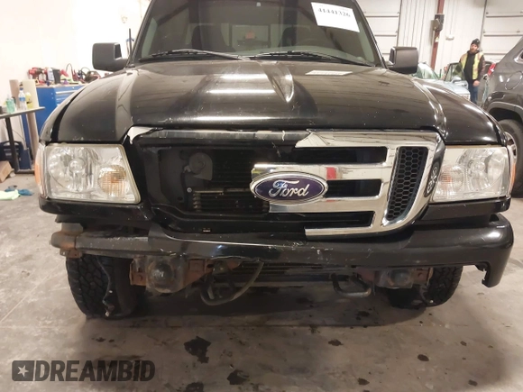 2009 Ford Ranger XLT with VIN 1FTZR45E79PA63934, listed as a IAAI auction lot 41441326 with 153,140 mi miles. Bid and sale history available at carsss.com. Image 6.