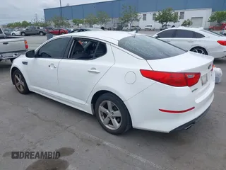 2015 Kia Optima LX with VIN KNAGM4A74F5662579, listed as a IAAI auction lot 42127251 with 144,138 mi miles and . Bid and sale history available at carsss.com. Image 3.