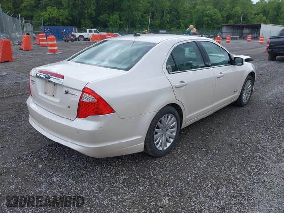 2010 Ford Fusion Hybrid with VIN 3FADP0L30AR200029, listed as a IAAI auction lot 42394846 with 192,634 mi miles and . Bid and sale history available at DreamBid. Image 4.