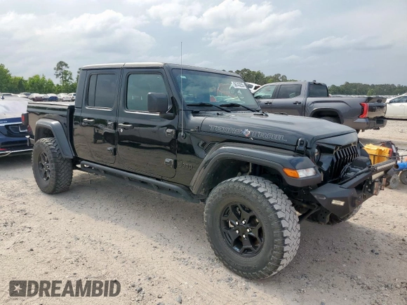 2023 Jeep Gladiator Freedom with VIN 1C6HJTAG7PL531273, listed as a Copart auction lot 56743255 with 41,226 mi miles and Salvage title. Bid and sale history available at DreamBid. Image 4.