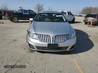 2010 Lincoln MKS EcoBoost with VIN 1LNHL9FT6AG612143, listed as a Copart auction lot 49469855 with 154,310 mi miles and Salvage Title. Bid and sale history available at DreamBid. Image 5.