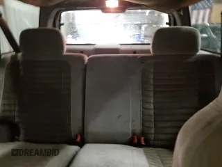 1995 Jeep Grand Cherokee Laredo with VIN 1J4GZ58S6SC630947, listed as a Copart auction lot 82143564 with 267,946 mi miles and Salvage Title. Bid and sale history available at carsss.com. Image 10.