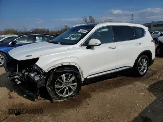 2019 Hyundai Santa Fe Ultimate z VIN 5NMS5CAD7KH069719, wystawiony jako Copart lot #54000095 z przebiegiem 78 023 mil mil oraz Szkoda całkowita • Salvage title. Historia ofert i sprzedaży dostępna na DreamBid. Obrazek 1.