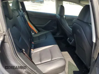 2023 Tesla Model 3 with VIN 5YJ3E1EA3PF695267, listed as a Copart auction lot 52559645 with 9,025 mi miles and Salvage title. Bid and sale history available at DreamBid. Image 10.