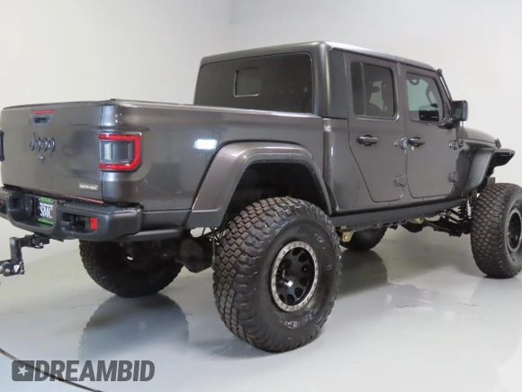 2023 Jeep Gladiator Freedom z VIN 1C6HJTAG2PL519578, wystawiony jako Copart lot #58429715 z przebiegiem 41 914 mil mil oraz Szkoda całkowita • Salvage title. Historia ofert i sprzedaży dostępna na DreamBid. Obrazek 3.