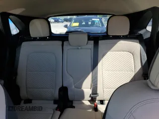 2020 Ford Escape SE z VIN 1FMCU9G69LUB63156, wystawiony jako Copart lot #57412545 z przebiegiem 82 230 mil mil oraz Czysty tytuł • Clean title. Historia ofert i sprzedaży dostępna na DreamBid. Obrazek 10.