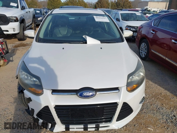 2013 Ford Focus Titanium with VIN 1FADP3J22DL167324, listed as a IAAI auction lot 41616927 with 127,259 mi miles and . Bid and sale history available at carsss.com. Image 12.