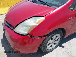 2007 Toyota Prius z VIN JTDKB20U477616450, wystawiony jako IAAI lot #42304173 z przebiegiem 258 469 mil mil oraz . Historia ofert i sprzedaży dostępna na DreamBid. Obrazek 6.