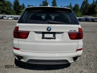 2012 BMW X5 35i with VIN 5UXZV4C5XCL987618, listed as a Copart auction lot 60308965 with 98,195 mi miles and Salvage title. Bid and sale history available at DreamBid. Image 6.