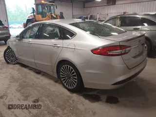2018 Ford Fusion Titanium with VIN 3FA6P0RU9JR131818, listed as a IAAI auction lot 42442448 with 191,757 mi miles and . Bid and sale history available at DreamBid. Image 3.
