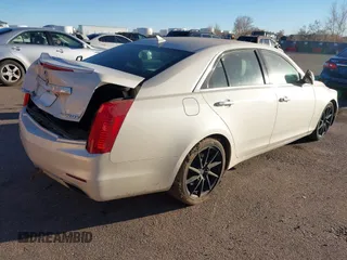 2014 Cadillac CTS Luxury AWD z VIN 1G6AX5SX3E0149360, wystawiony jako IAAI lot #41020479 z przebiegiem 98 917 mil mil oraz . Historia ofert i sprzedaży dostępna na DreamBid. Obrazek 4.