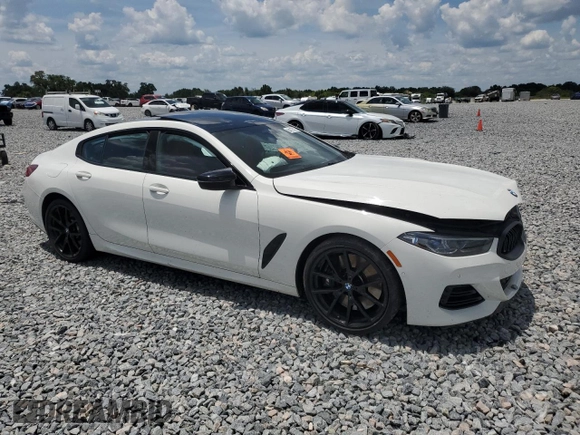 2023 BMW 8 Series M850i with VIN WBAGV8C07PCL57496, listed as a Copart auction lot 64175375 with Not provided miles and Non repairable. Bid and sale history available at DreamBid. Image 4.