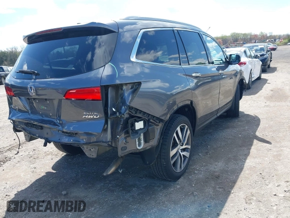 2016 Honda Pilot Elite with VIN 5FNYF6H06GB058392, listed as a IAAI auction lot 41983804 with 103,304 mi miles. Bid and sale history available at carsss.com. Image 4.