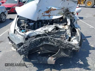 2010 Honda Insight EX with VIN JHMZE2H71AS012927, listed as a IAAI auction lot 42455037 with Not provided miles and . Bid and sale history available at DreamBid. Image 6.