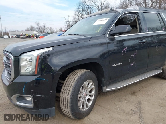 2015 GMC Yukon SLT z VIN 1GKS1BKCXFR192349, wystawiony jako IAAI lot #41842474 z przebiegiem 185 166 mil mil oraz . Historia ofert i sprzedaży dostępna na DreamBid. Obrazek 6.