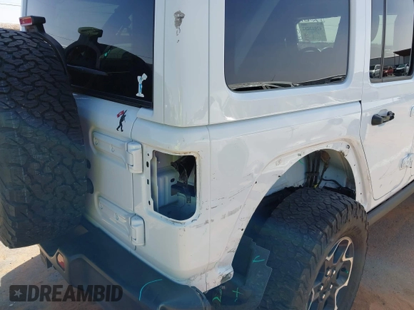 2023 Jeep Wrangler Rubicon with VIN 1C4JJXR63PW580370, listed as a IAAI auction lot 42017282 with 31,823 mi miles and . Bid and sale history available at DreamBid. Image 18.