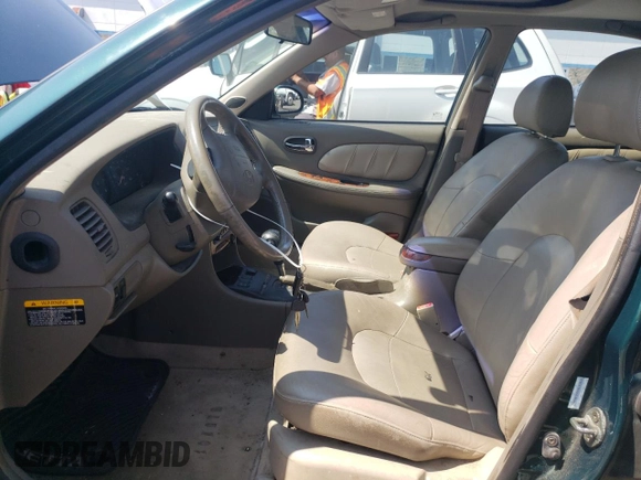 1999 Hyundai Sonata GLS with VIN KMHWF35V9XA100869, listed as a Copart auction lot 68219694 with 144,388 mi miles and Non Repairable. Bid and sale history available at carsss.com. Image 7.