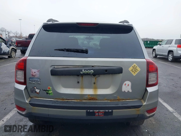 2014 Jeep Compass Sport with VIN 1C4NJDBB8ED734667, listed as a IAAI auction lot 41836914 with 221,028 mi miles. Bid and sale history available at carsss.com. Image 16.