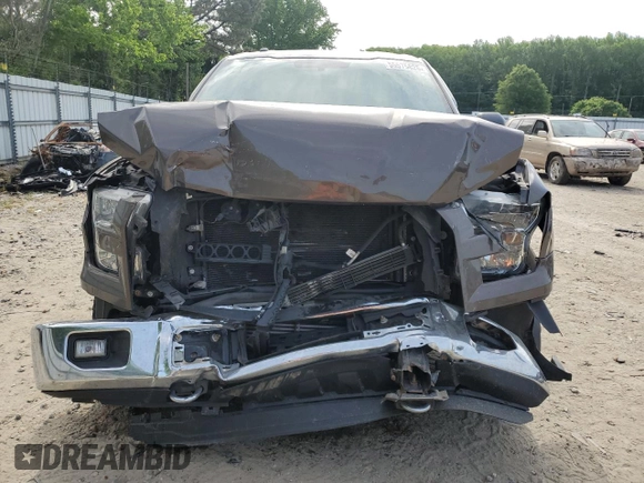 2016 Ford F-150 XLT with VIN 1FTFX1EG2GFB17717, listed as a Copart auction lot 55575825 with 122,867 mi miles and Salvage title. Bid and sale history available at DreamBid. Image 5.